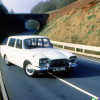 DALL·E 2022-08-21 15.17.19 - White rover p6 on a 1960s motorway .png